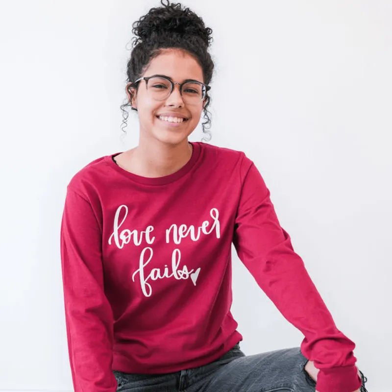 Love Never Fails Crew Longsleeve