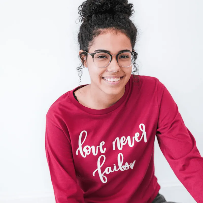 Love Never Fails Crew Longsleeve