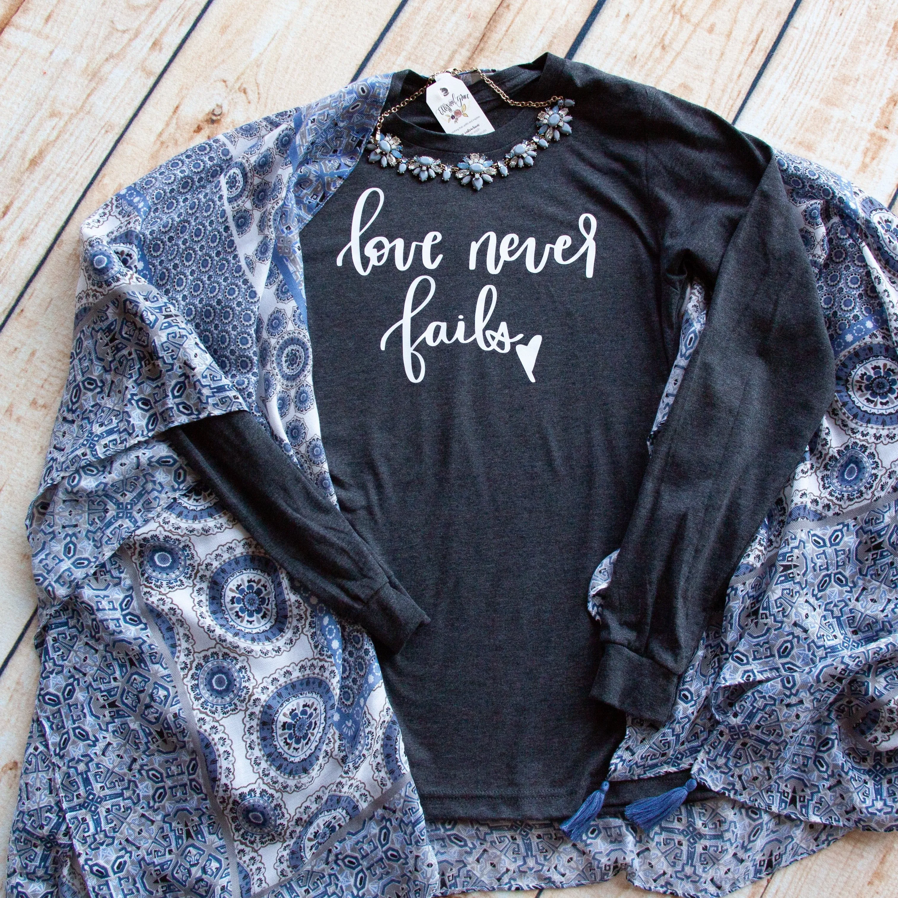 Love Never Fails Crew Longsleeve