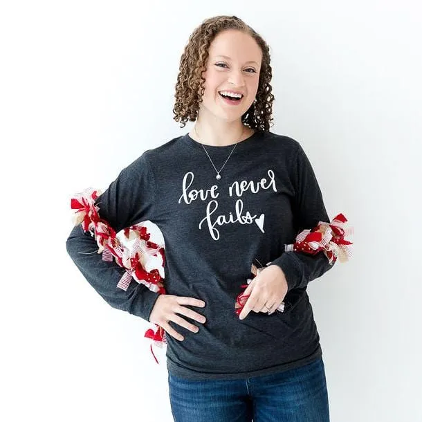 Love Never Fails Crew Longsleeve